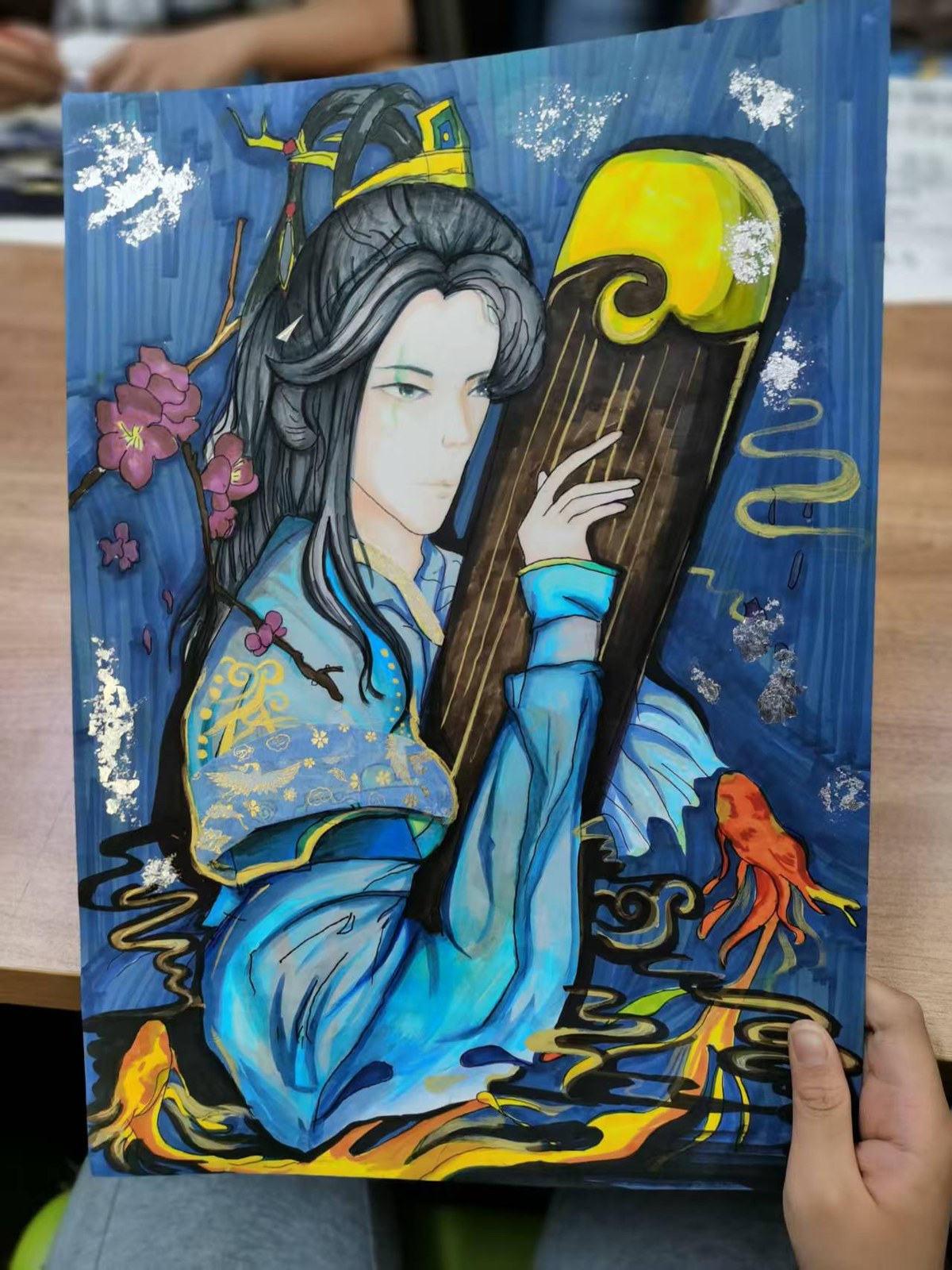 Gouache painting of a musician in flowing blue classical robes holding a guqin, with plum blossoms and goldfish on a deep blue ground